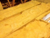 Attic insulation and flooring - During.